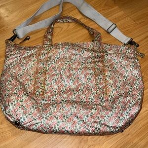 Bonpoint diaper bag in Liberty Of London Print, matching diaper changing pad